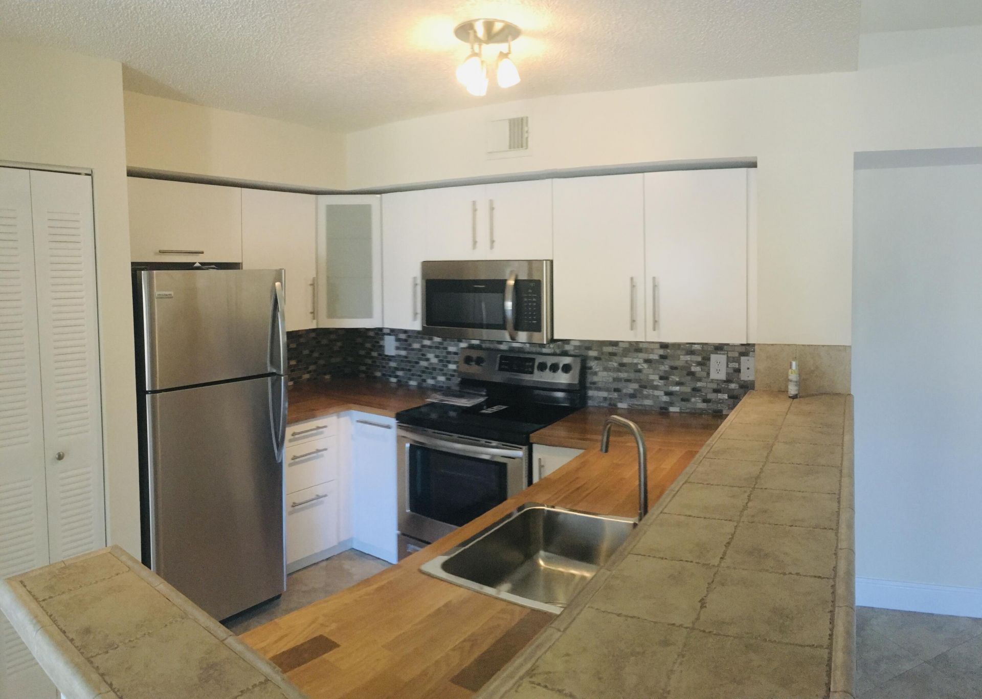 1721 Village Boulevard, Unit 303, West Palm Beach, FL 33409 Photo