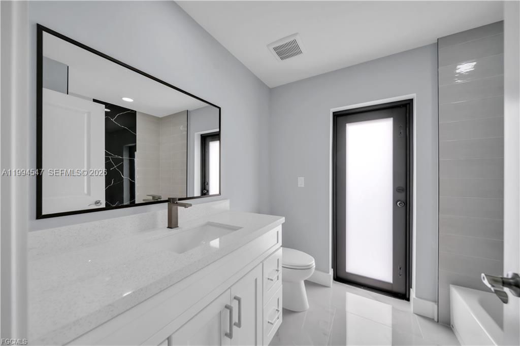 4028 26th St SW , Lehigh Acres, FL 33976 Photo