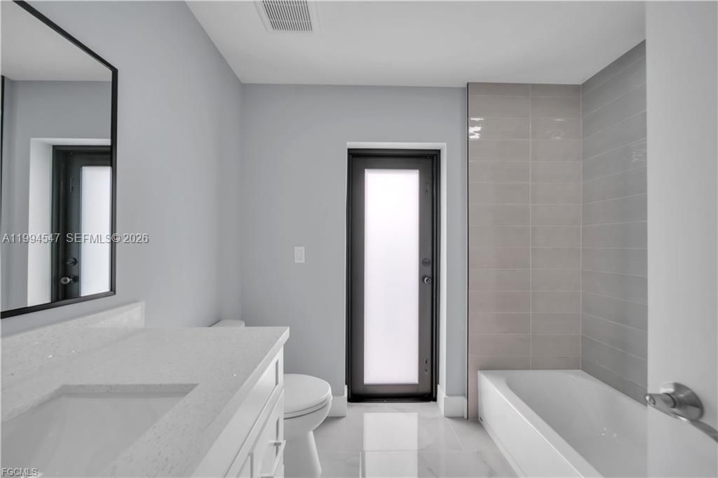 4028 26th St SW , Lehigh Acres, FL 33976 Photo