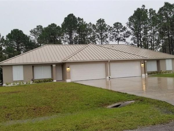 385/387 Carrillon AVE S, LEHIGH ACRES, FL 33974