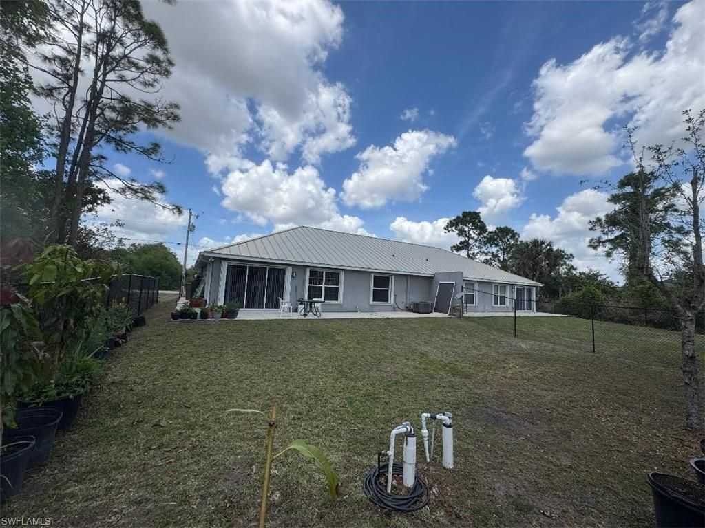 385/387 Carrillon Ave S, Lehigh Acres, FL 33974 Photo