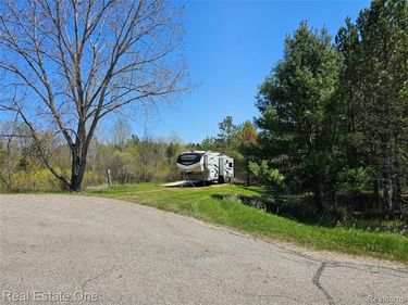 knights court , Butman Twp, MI 48624