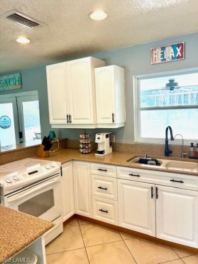 640 27th St Sw, Naples, FL 34117 Photo