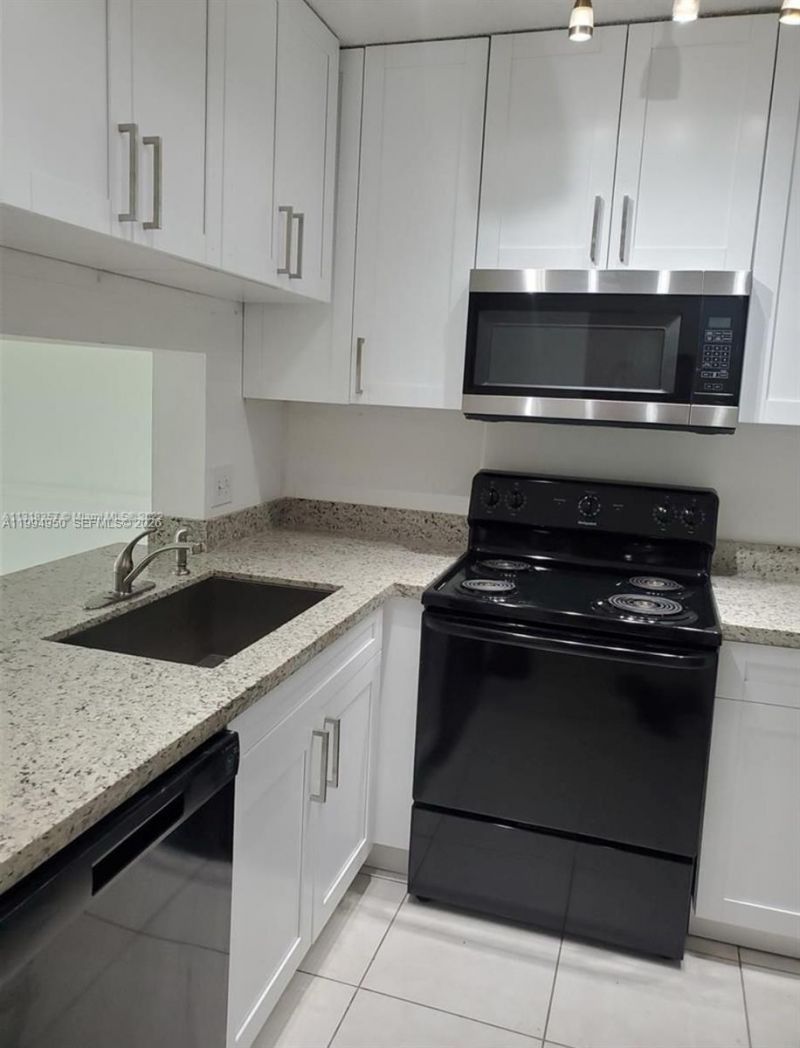 7435 Woodmont Ter , Unit 202, Tamarac, FL 33321 Photo