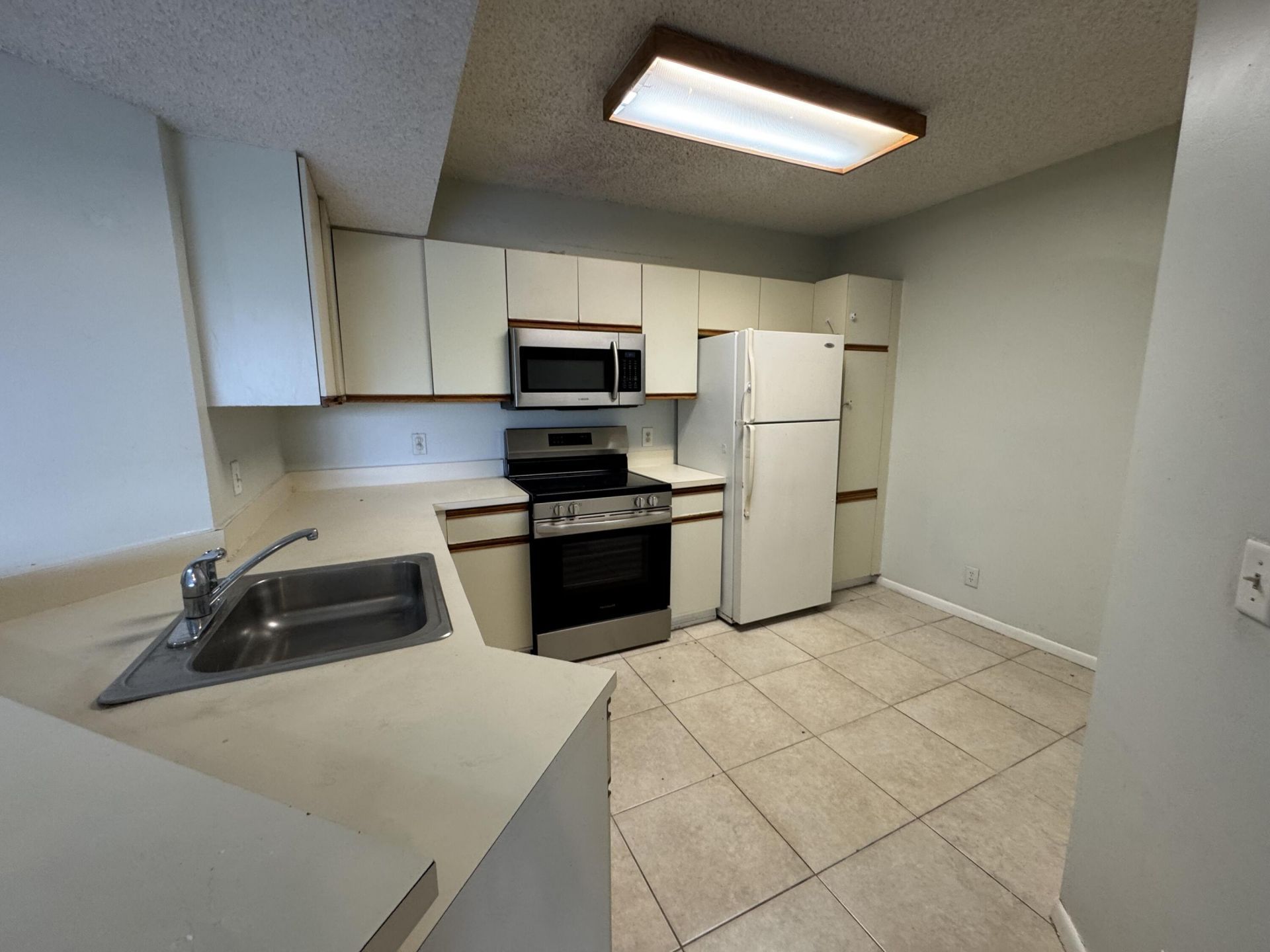 8891 Wiles Road, Unit 303, Coral Springs, FL 33067 Photo