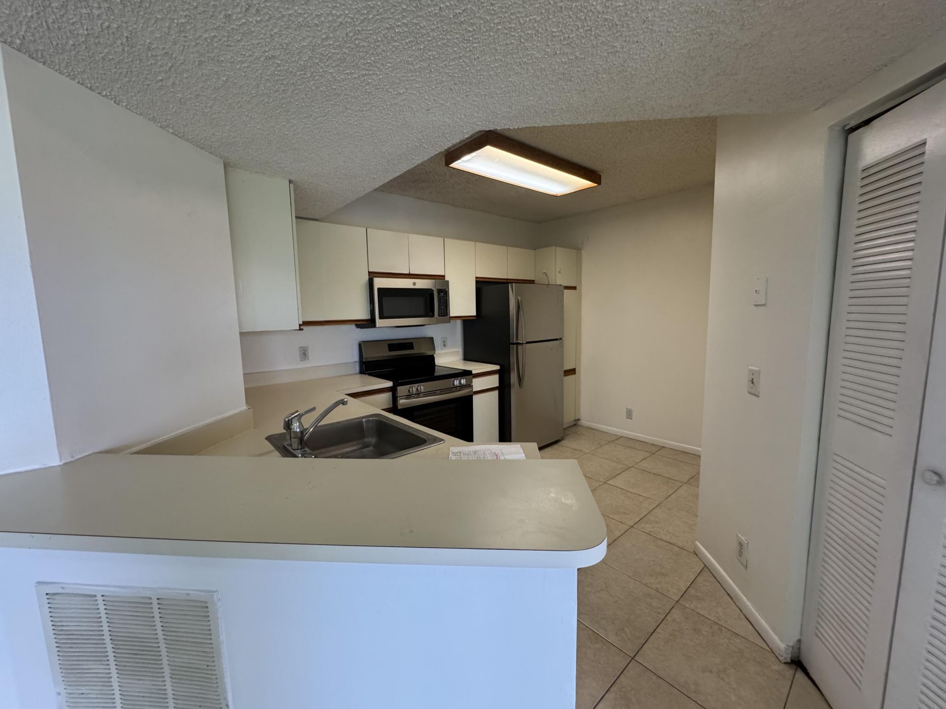 8891 Wiles Road, Unit 303, Coral Springs, FL 33067 Photo