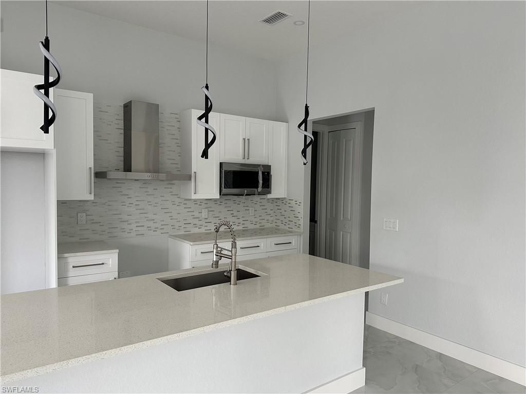 3516 SW 3rd St , Cape Coral, FL 33991 Photo