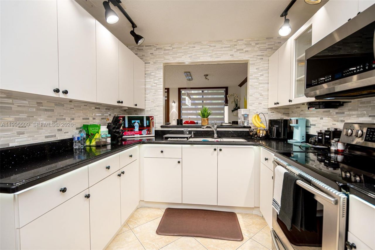 9955 Costa Del Sol Blvd, Unit H-108B, Doral, FL 33178 Photo