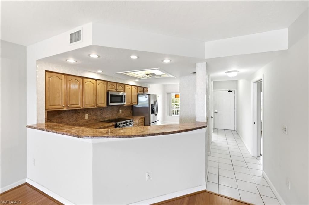 13105 Vanderbilt Dr, Unit 407, Naples, FL 34110 Photo