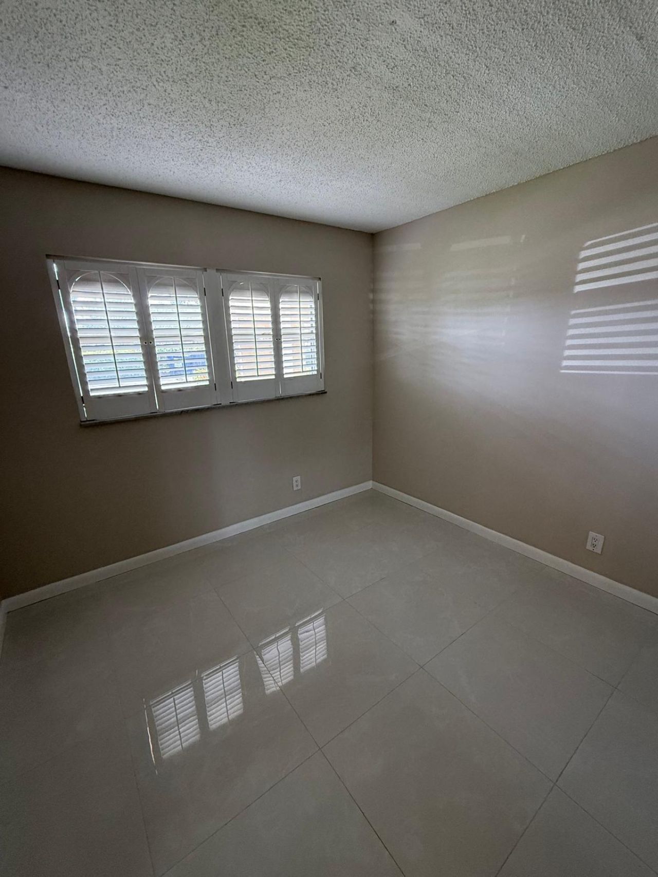 9911 Sandalfoot Boulevard, Unit 105, Boca Raton, FL 33428 Photo
