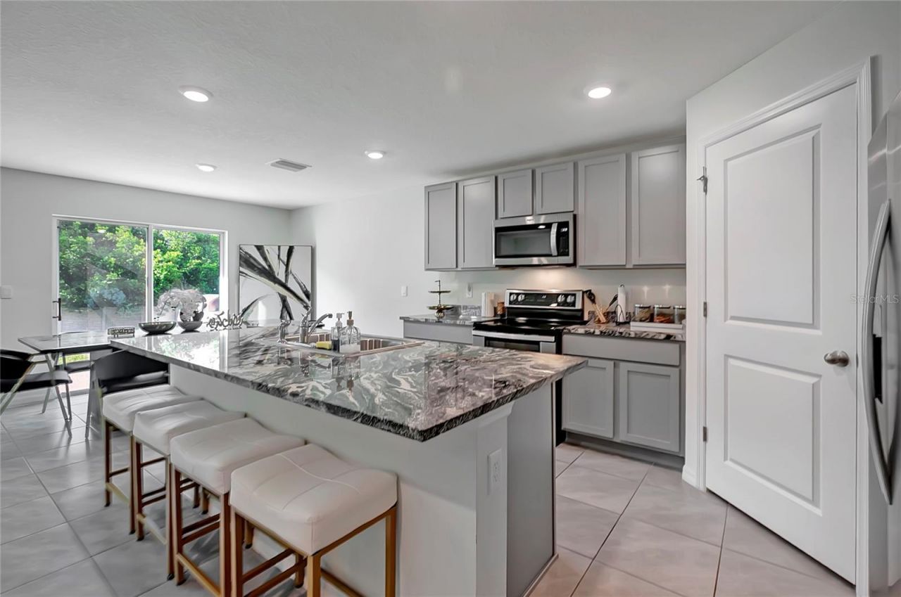 7737 Rosewood Garden Loop , Tampa, FL 33637 Photo