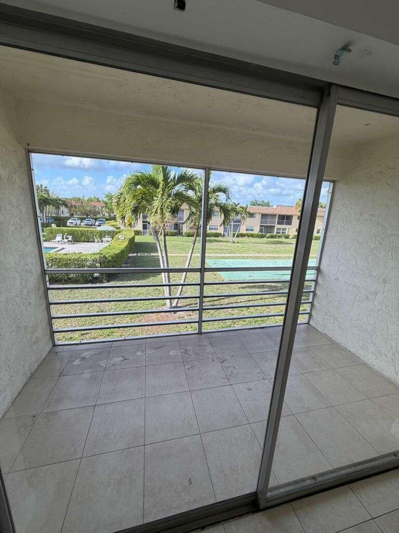 9851 Sandalfoot Boulevard, Unit 220, Boca Raton, FL 33428 Photo
