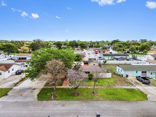 1560 Roy Drive, West Palm Beach, FL 33415