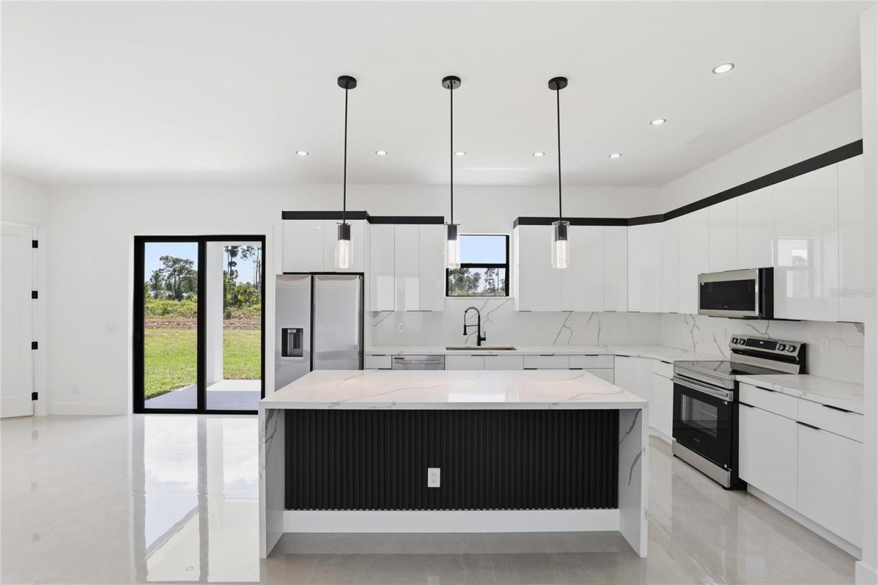 1124 S Edelweiss Street E, Lehigh Acres, FL 33974 Photo