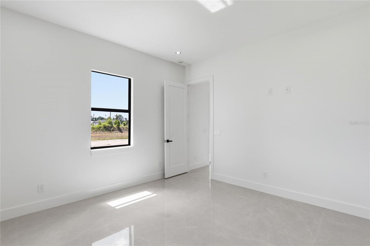 1124 S Edelweiss Street E, Lehigh Acres, FL 33974 Photo