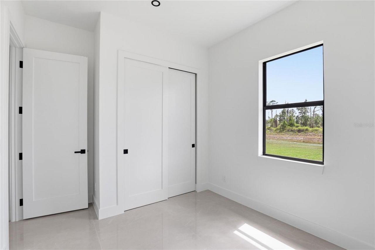 1124 S Edelweiss Street E, Lehigh Acres, FL 33974 Photo