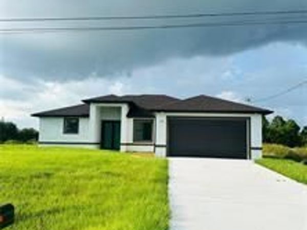 545 Trinity ST E, LEHIGH ACRES, FL 33974