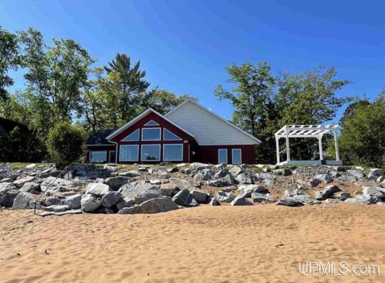 W3602 Squaw Beach Road, Powell Twp, MI 49808 Main Photo