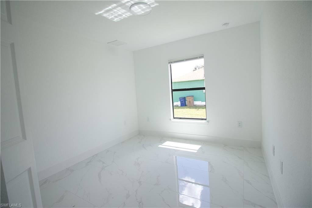 118 Parish Dr , Lehigh Acres, FL 33974 Photo