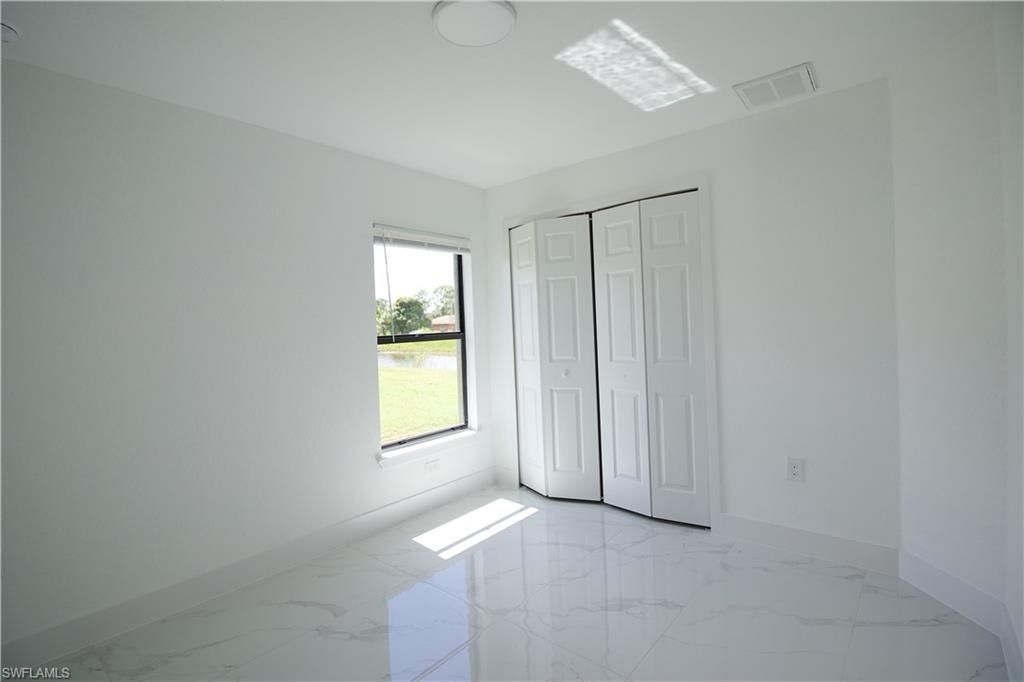 118 Parish Dr , Lehigh Acres, FL 33974 Photo