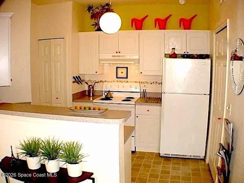 5693 Star Rush Drive , Unit 204, Melbourne, FL 32940 Photo