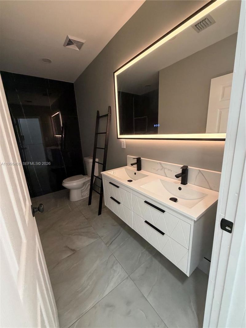 596 Ragan Dr , Miami Springs, FL 33166 Photo