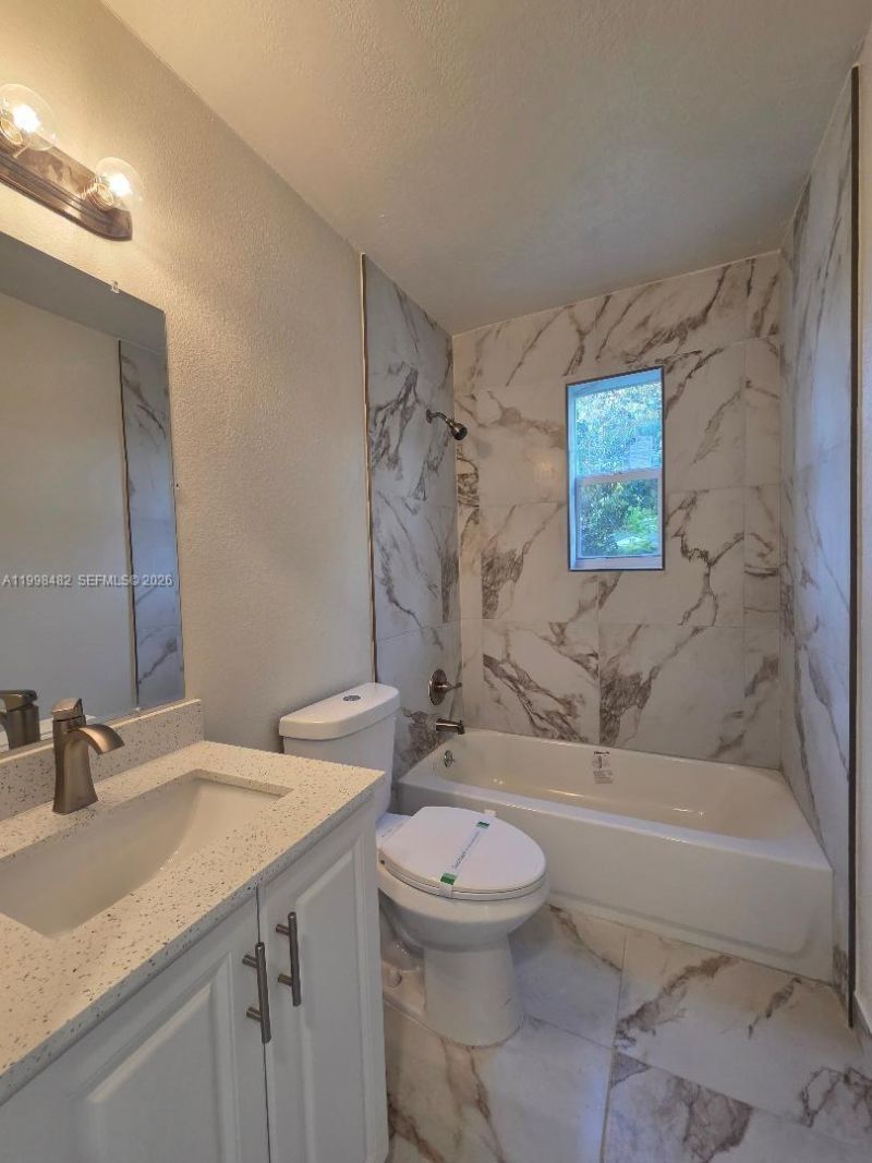 295 NW 48th St , Miami, FL 33127 Photo