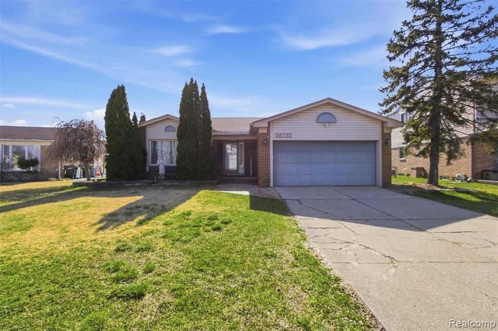 38737 Woodmont Drive, Sterling Heights, MI 48310 Main Photo