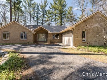 3140 Riverwoods Drive NE, Rockford, MI 49341