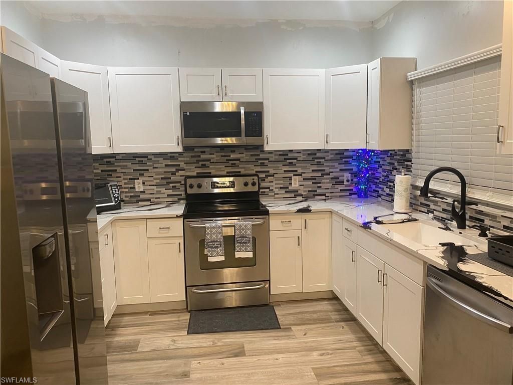 3304 Lisa Ln, Unit 102, Naples, FL 34109 Photo