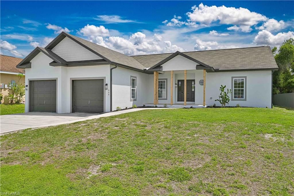 668 Kingsbury St E, Lehigh Acres, FL 33974 Photo