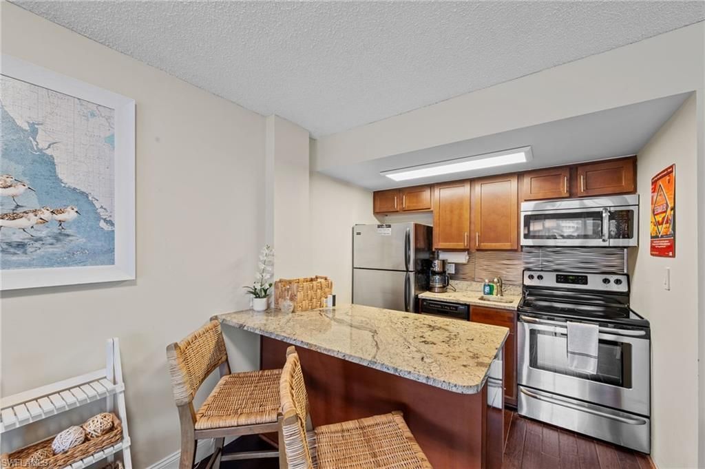 1 Bluebill Ave, Unit 402, Naples, FL 34108 Photo