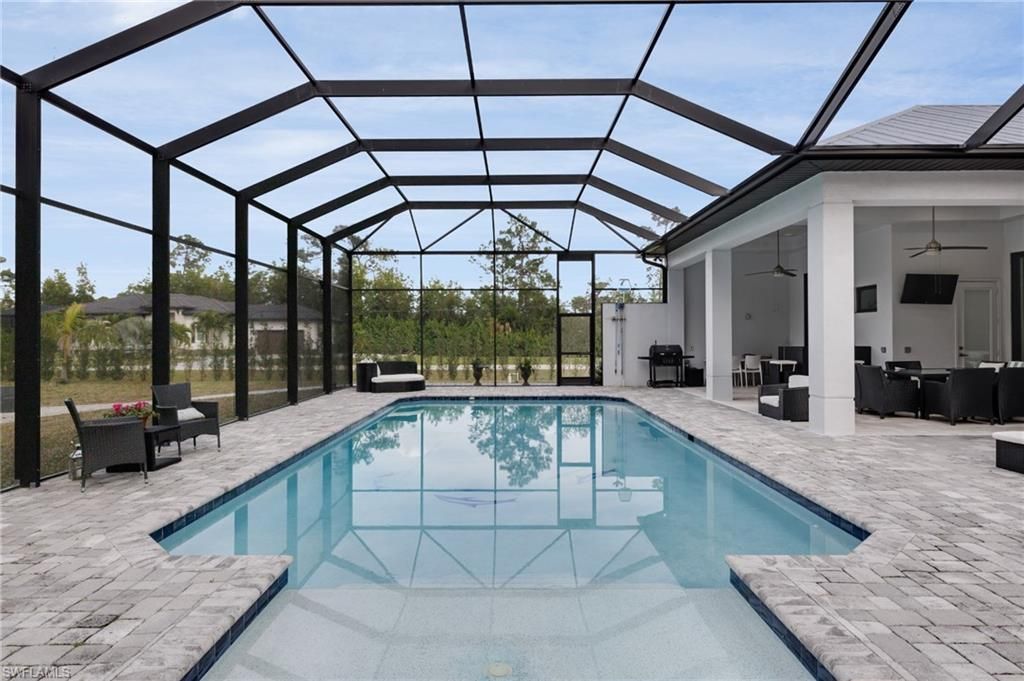 6423 Livingston Woods Ln, Naples, FL 34109 Photo