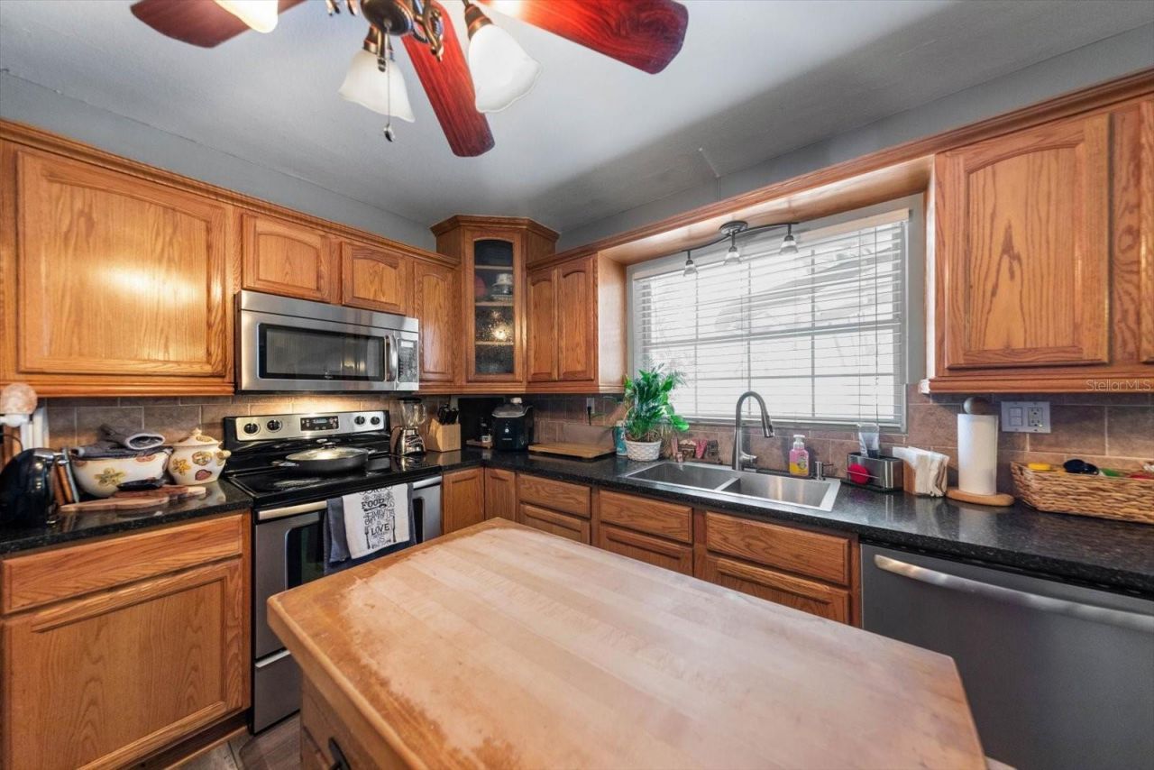 5042 Lake Charles Drive N, Kenneth City, FL 33709 Photo