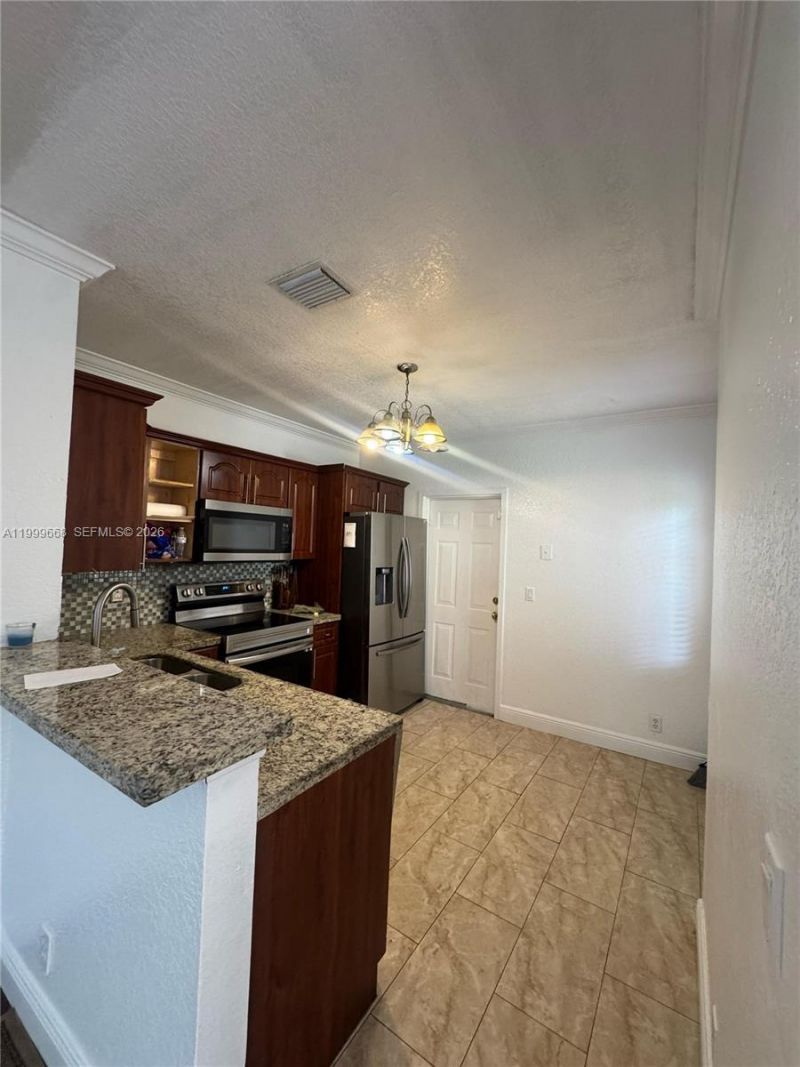 7659 Tamarac Island Circle, Tamarac, FL 33321 Photo