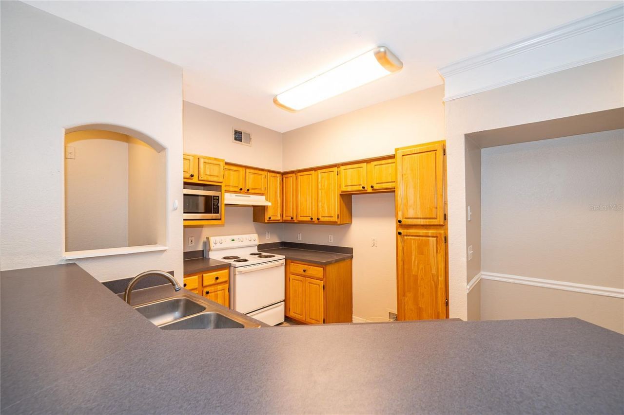 6663 Queens Borough Avenue, Unit 208, Orlando, FL 32835 Photo