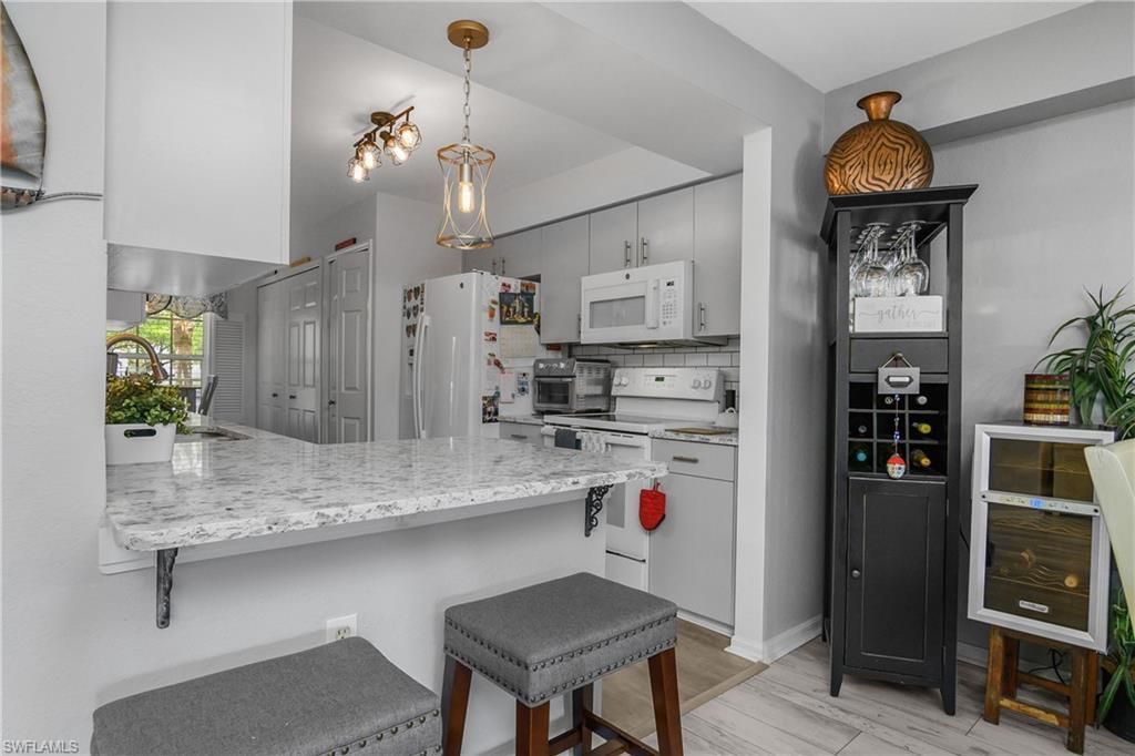 15475 Cedarwood Ln, Unit 203, Naples, FL 34110 Photo