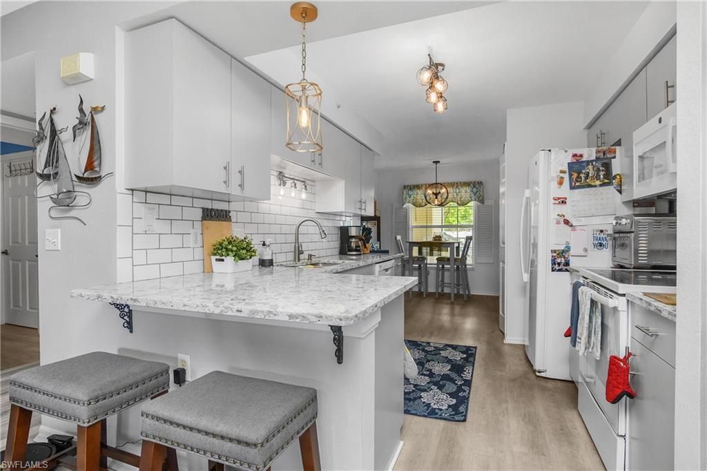 15475 Cedarwood Ln, Unit 203, Naples, FL 34110 Photo