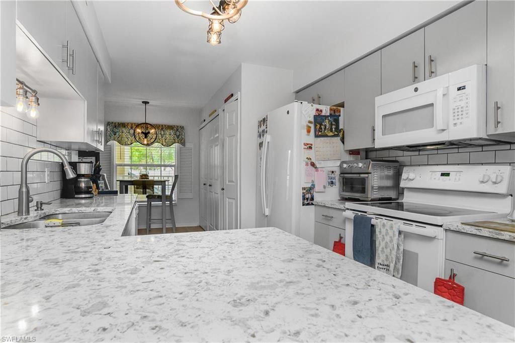 15475 Cedarwood Ln, Unit 203, Naples, FL 34110 Photo