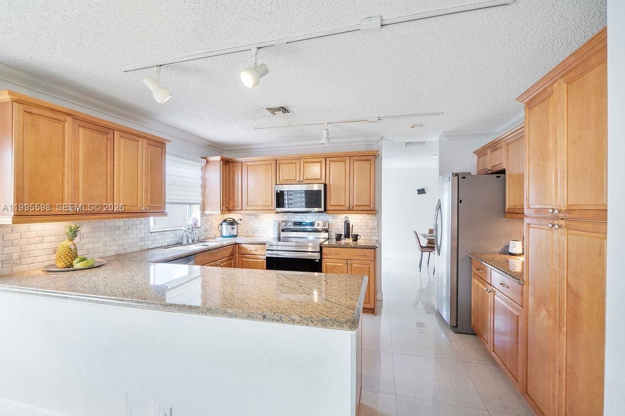 9602 NW 8th Cir, Plantation, FL 33324 Photo