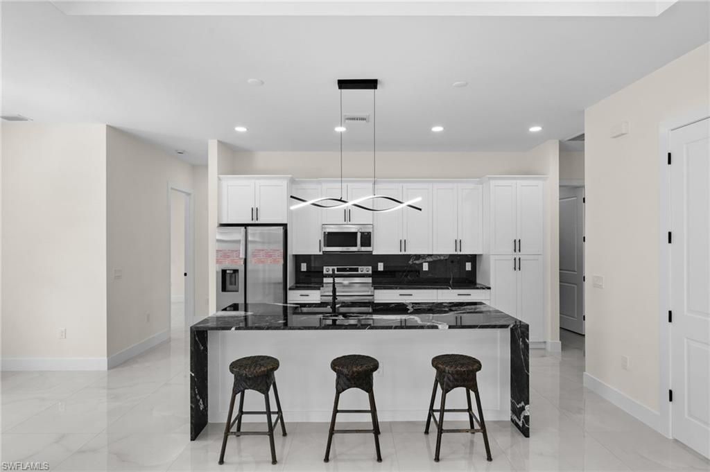 3319 30th St Sw, Lehigh Acres, FL 33976 Photo