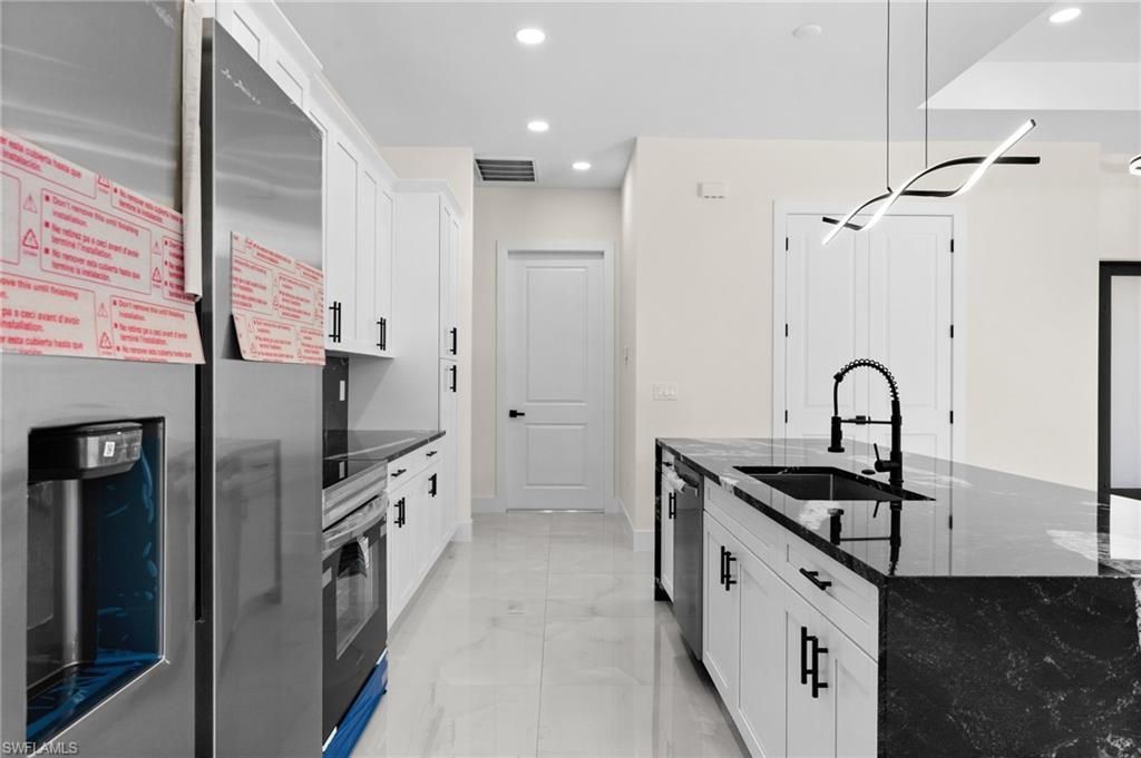 3319 30th St Sw, Lehigh Acres, FL 33976 Photo