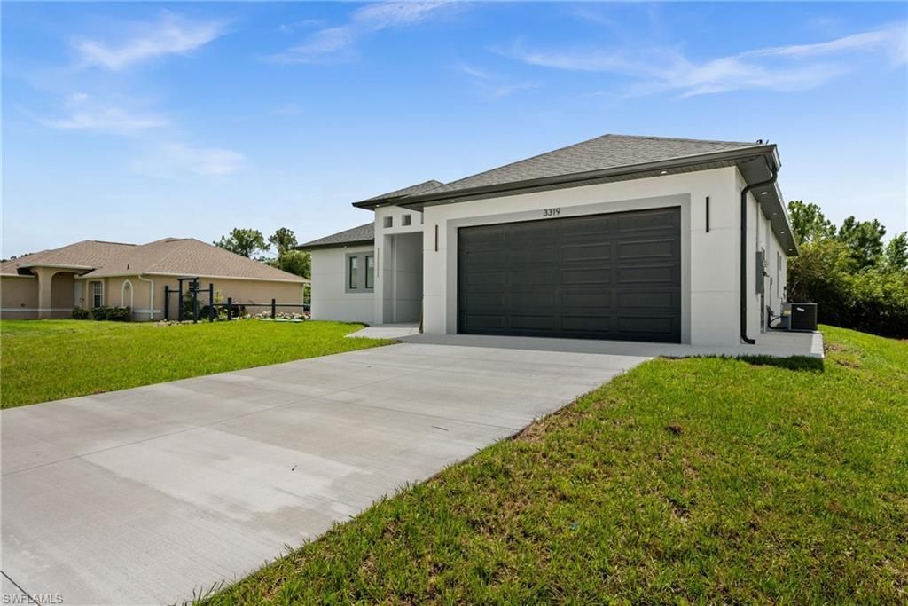 3319 30th St Sw, Lehigh Acres, FL 33976 Photo