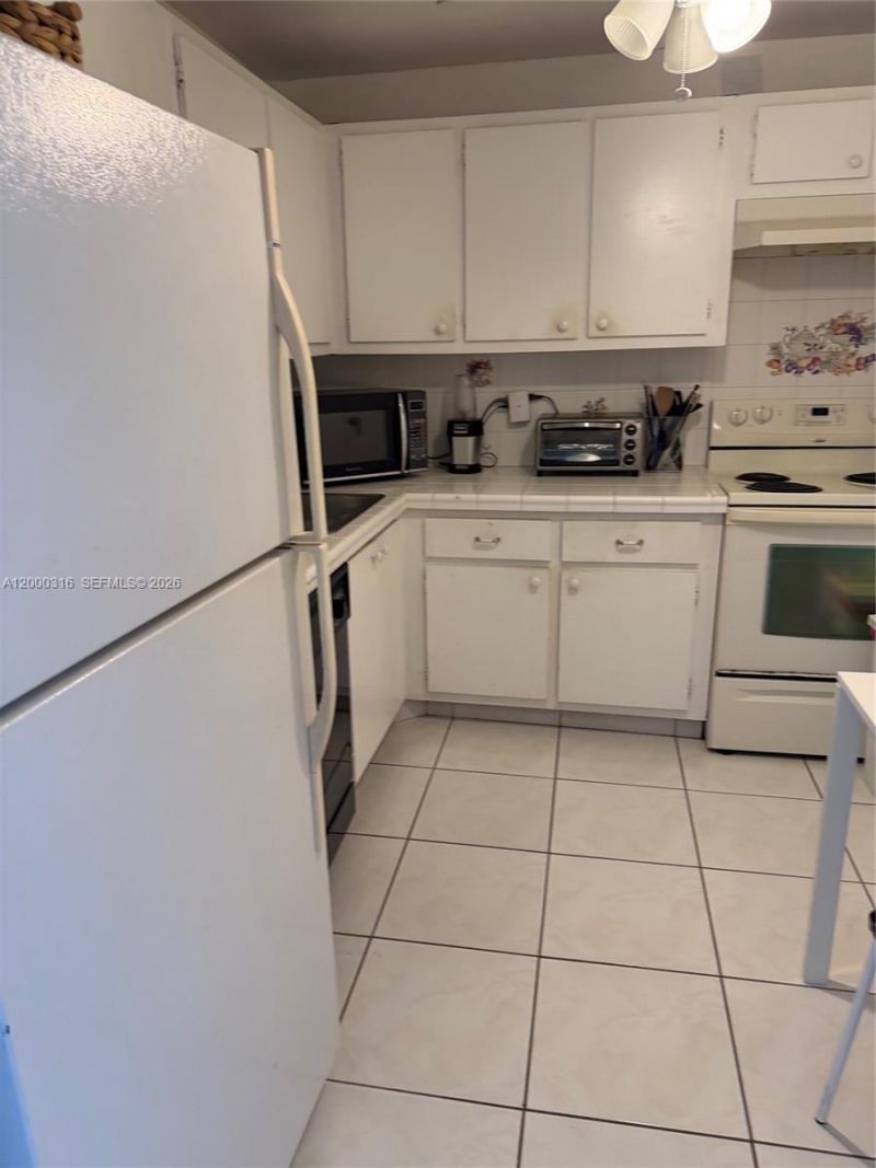 401 Golden Isles Dr, Unit 801, Hallandale Beach, FL 33009 Photo