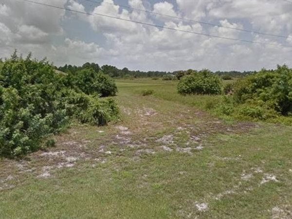 1128 Estate ST E, LEHIGH ACRES, FL 33974