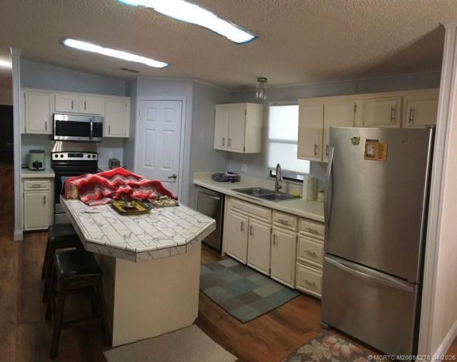 14591 SW Divot Drive, Unit A-20, Indiantown, FL 34956 Photo