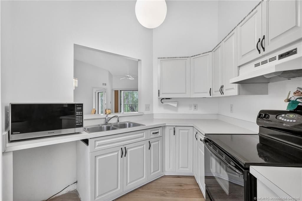 6031 SE Martinique Drive, Unit 202, Stuart, FL 34997 Photo