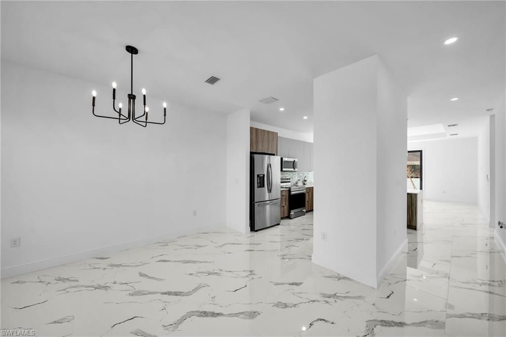 1208 NW 25th Pl, Cape Coral, FL 33993 Photo