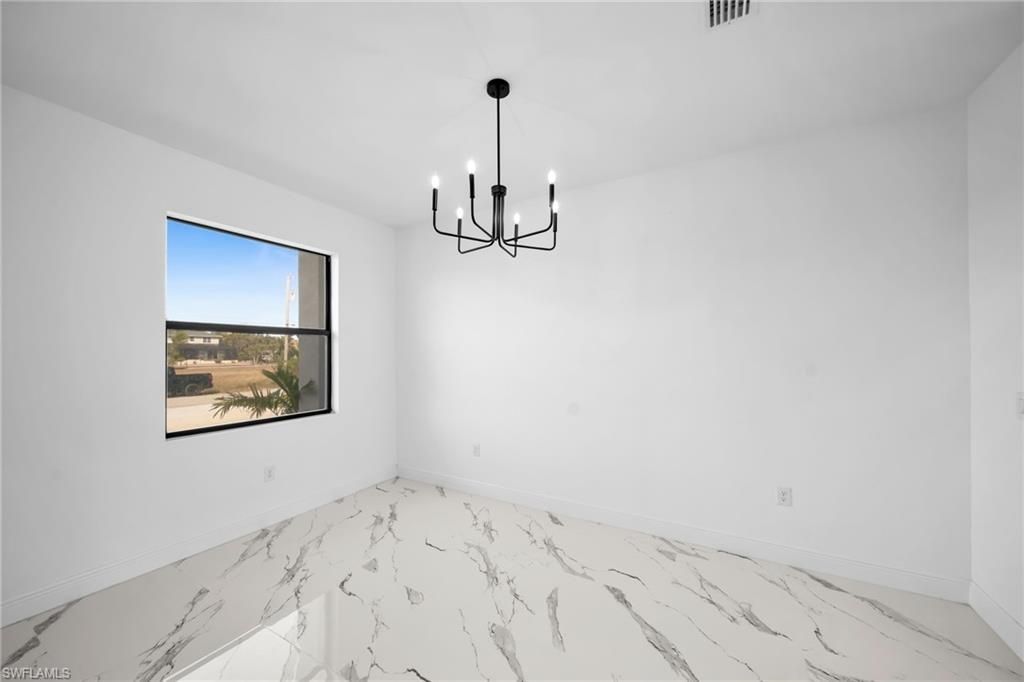 1208 NW 25th Pl, Cape Coral, FL 33993 Photo