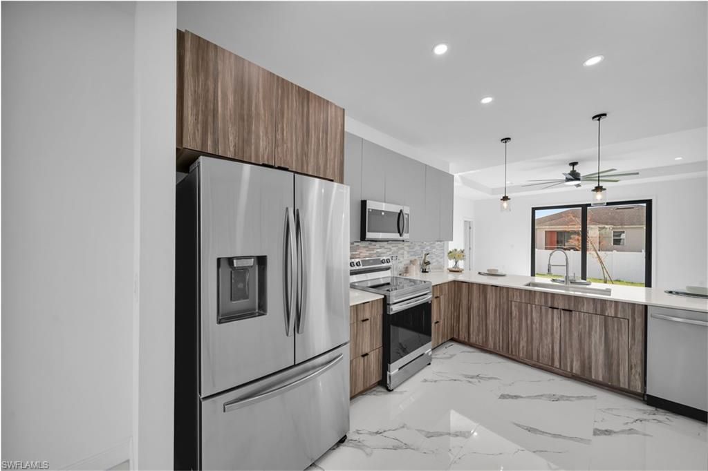 1208 NW 25th Pl, Cape Coral, FL 33993 Photo